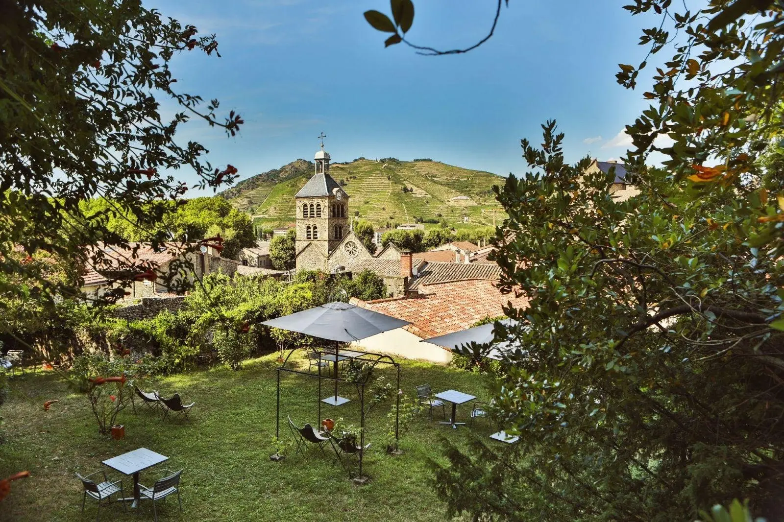 A bedroom overlooking the rooftops of Tournon-sur-Rhône